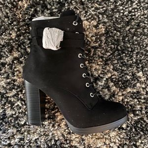Black heel booties.